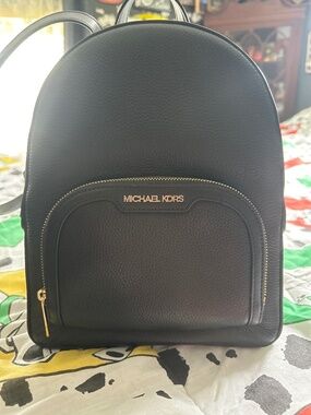 Michael Kors Leather Backpack.
